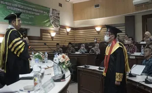 Disertasi Atribut Halal Produk Antarkan Arif Julianto Raih Gelar Doktor di UKSW