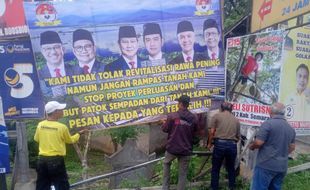 Pasang Spanduk Capres-Cawapres, Warga Tuntang Tolak Perluasan Rawa Pening