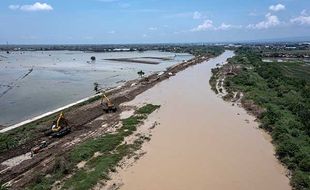 Progres Perbaikan Tanggul Jebol di Sungai Wulan Demak