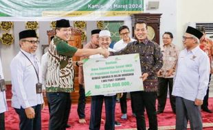 Berbagi Bahagia saat Ramadan, PT Pegadaian Manado Serahkan 1.000 Paket Sembako