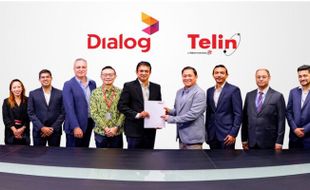 Telin dan Dialog Axiata Tanda Tangani Kemitraan Strategis