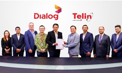 Telin dan Dialog Axiata Tanda Tangani Kemitraan Strategis