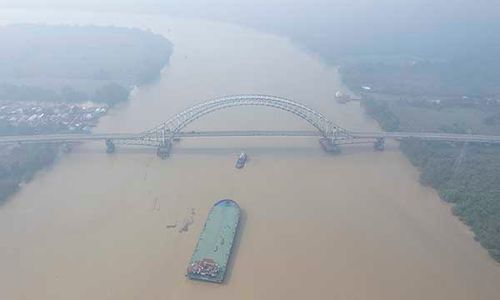 Wilayah Jambi Diselimuti Kabut Asap Akibat Kebakaran Hutan dan Lahan